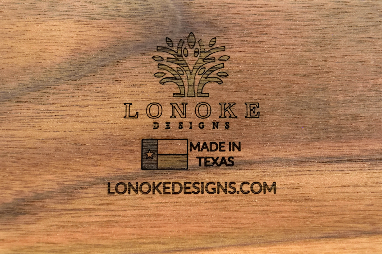 Tree Logo with lonokedesigns.com and Texas flag.
