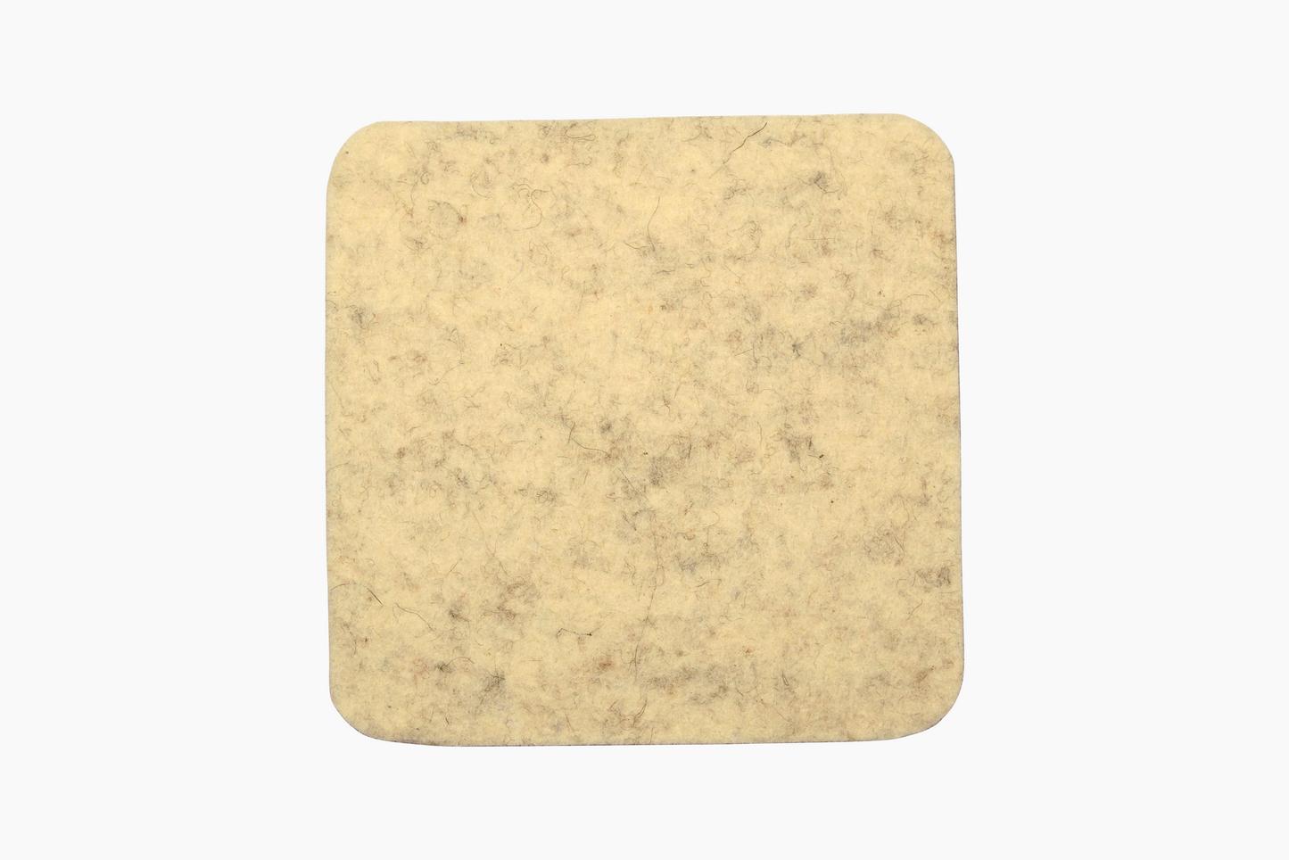 Square white wool coasters with a cork backing.