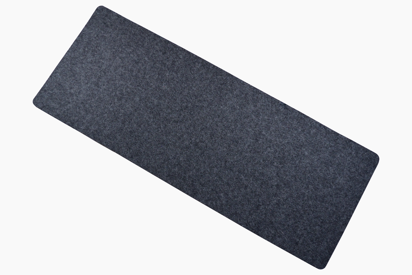A rectangular charcoal-colored desk mat made of wool felt and cork, displayed on a white background.