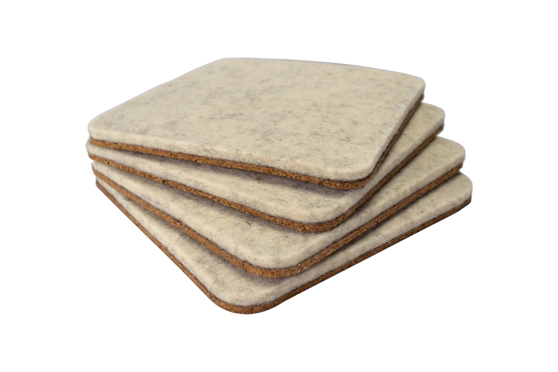 Stack of 4 Lonoke Designs Wool White wool felt and cork coasters.