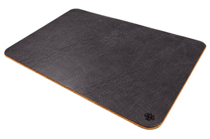 An Espresso dark-brown, veg-tanned leather rectangular mouse pad with rounded corners, angled to highlight the cork bottom, featuring a small Lonoke Designs logo in the bottom-right corner, set against a plain white background.