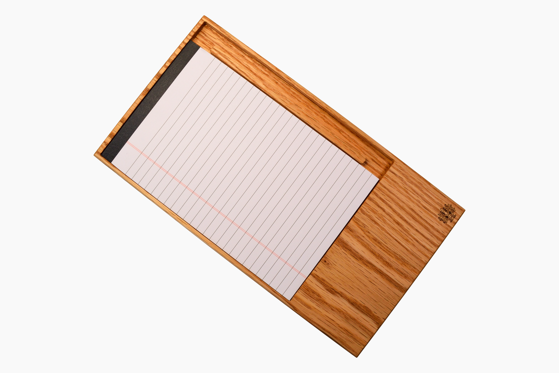 A notepad holder made of oak wood, designed to hold a notepad and pen securely in place.