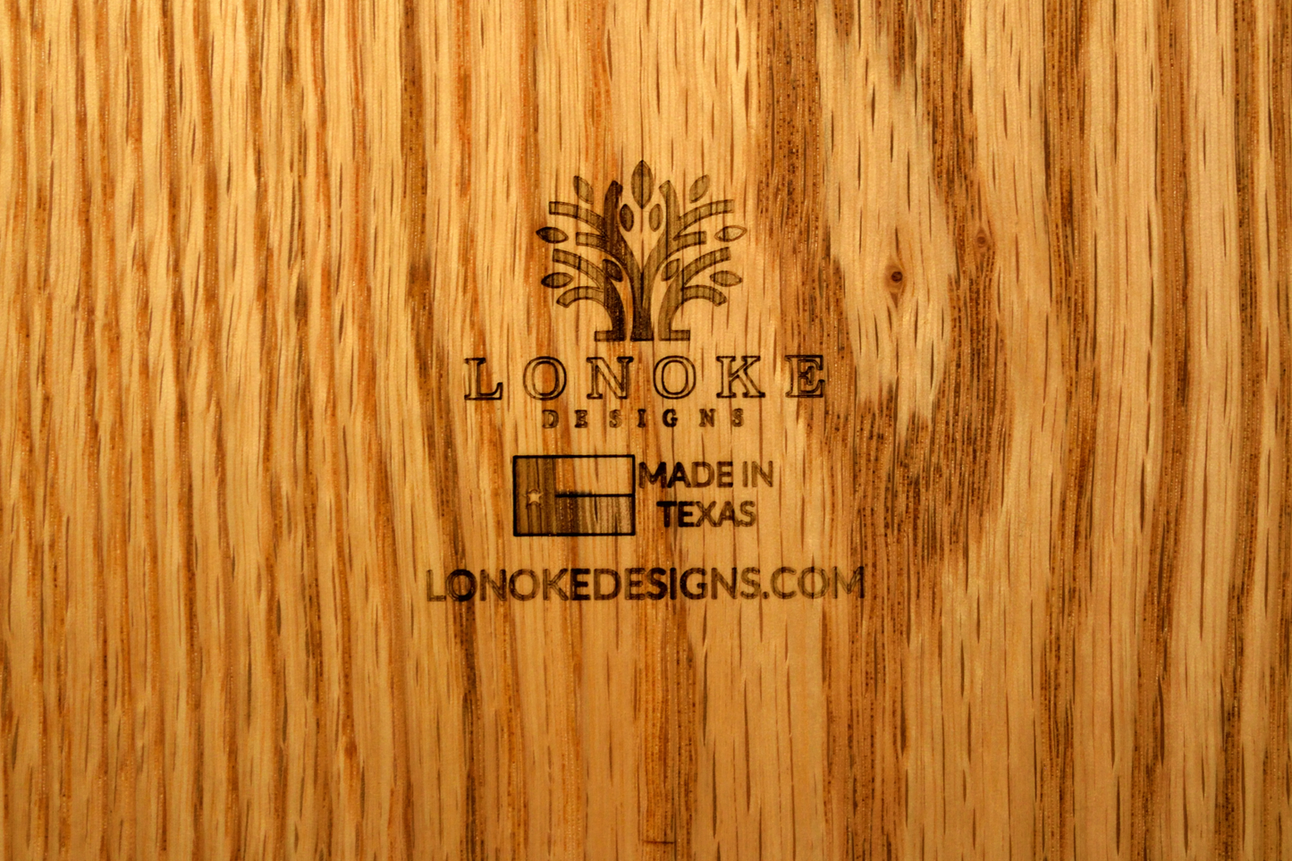 Lonoke Designs Logo with lonokedesigns.com and Texas Flag