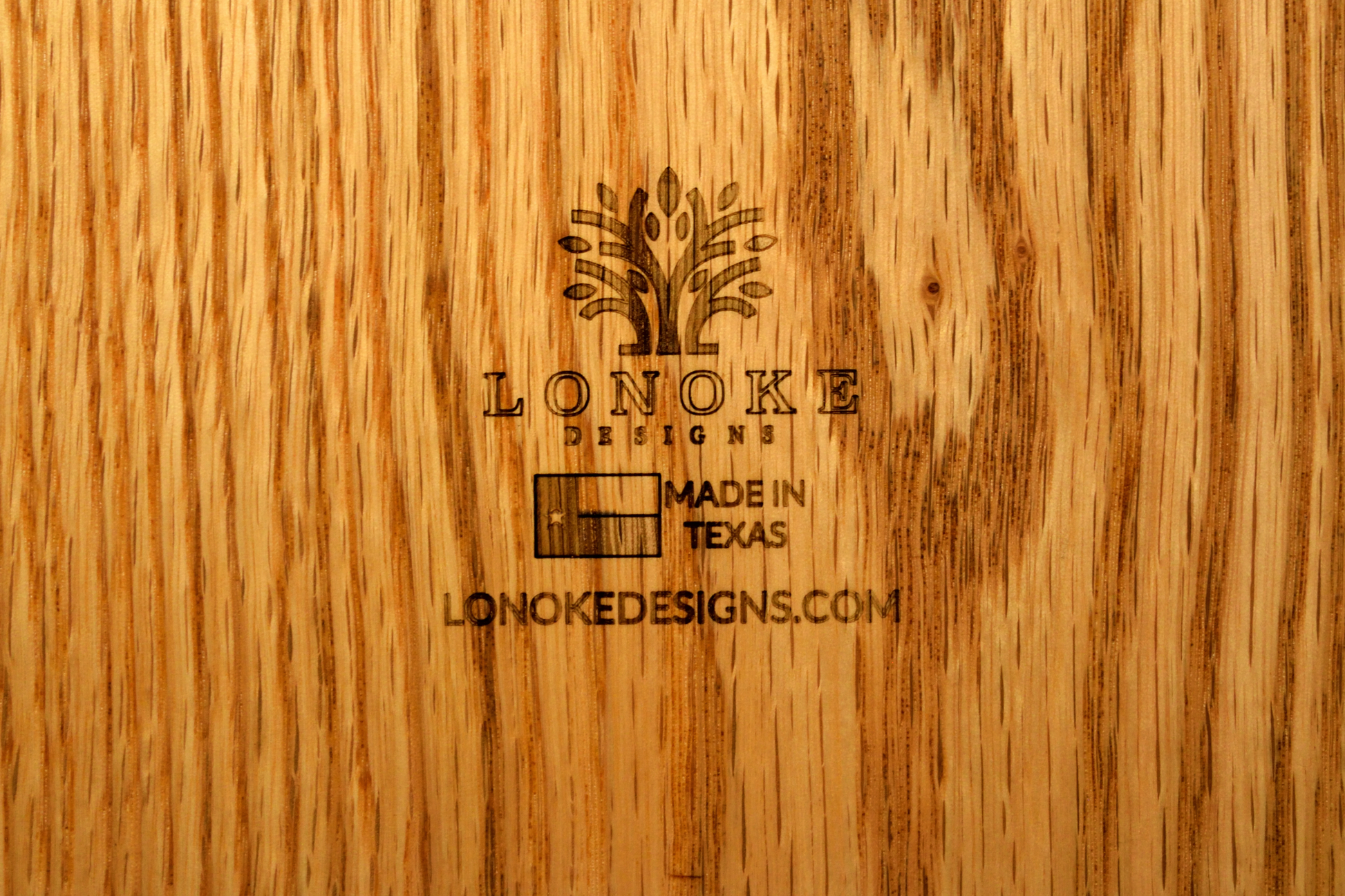 Lonoke Designs Logo with lonokedesigns.com and Texas Flag