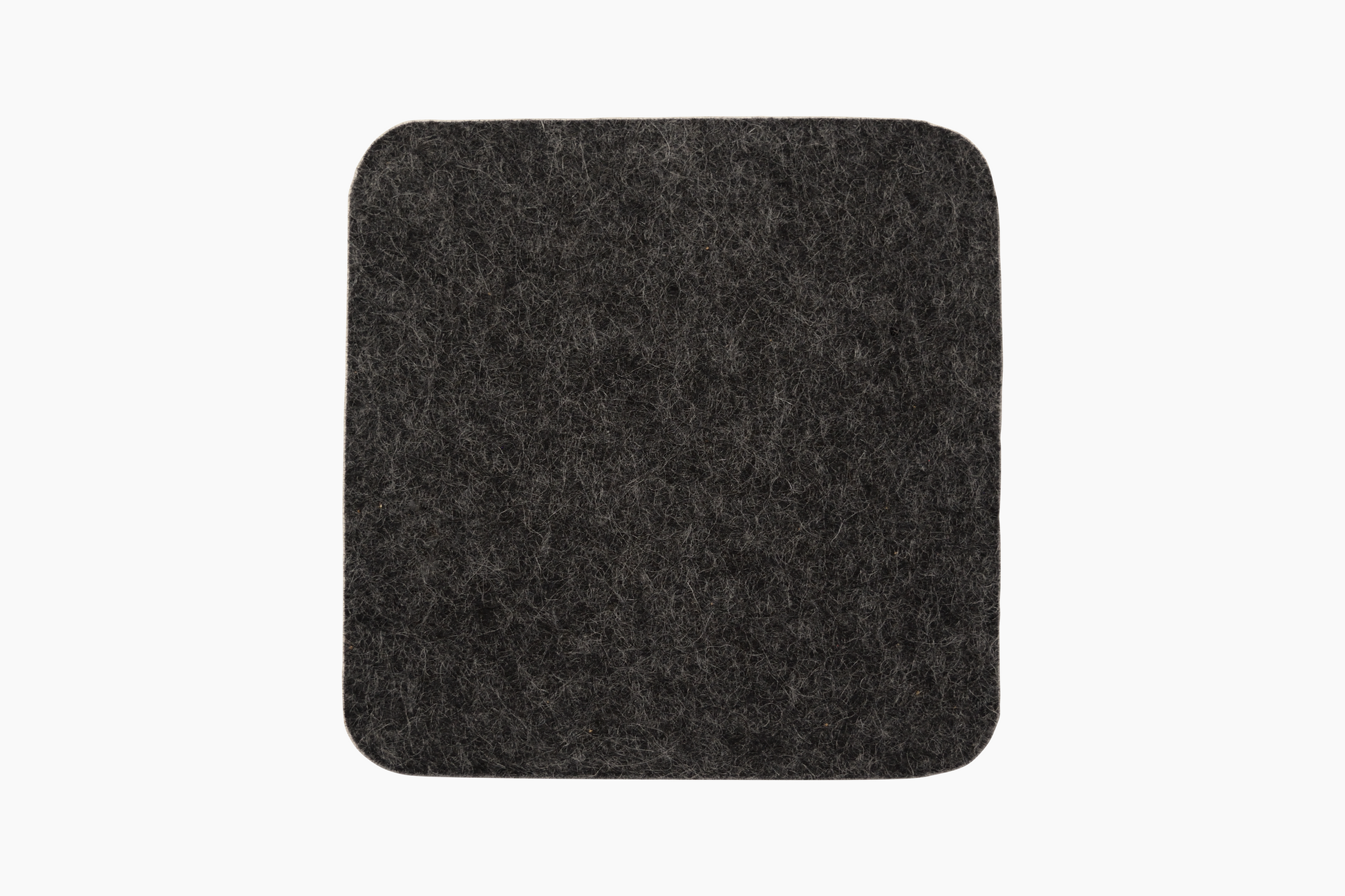 Single charcoal wool and cork coaster on white background.