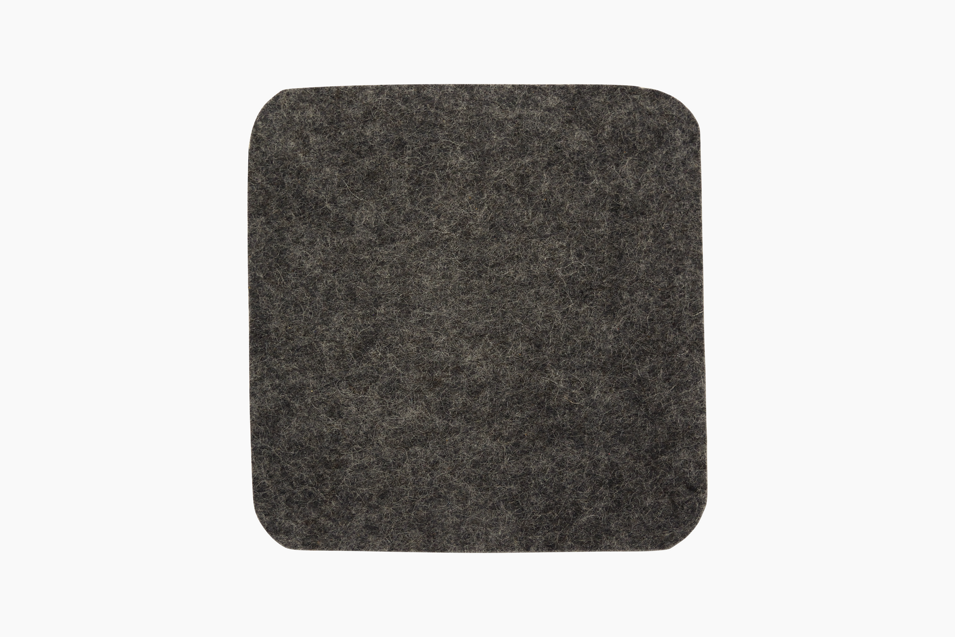 Square Shadow gray wool felt coasters with cork backing placed on a white surface.