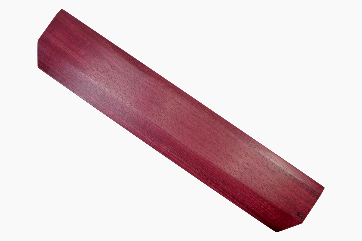 A Lonoke Designs Purpleheart wood mechanical keyboard wrist rest shown from a top-down angle on a solid white background.