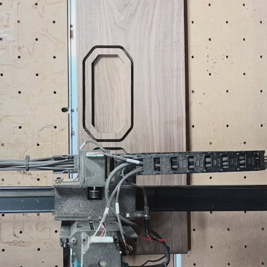 Video of the manufacturing process of the Lonoke Designs' walnut catchall organizer tray. Includes walnut being cut on a CNC-router, edge routing, and laser engraving.