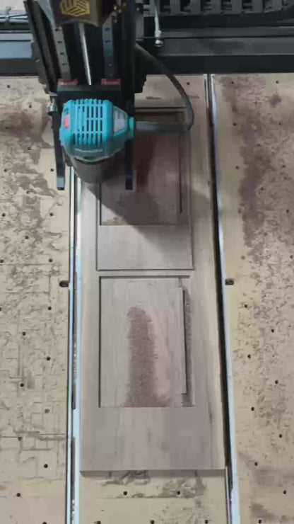 Video of the manufacturing process of the Lonoke Designs' walnut notepad holder. Includes walnut being cut on a CNC-router and laser engraving.
